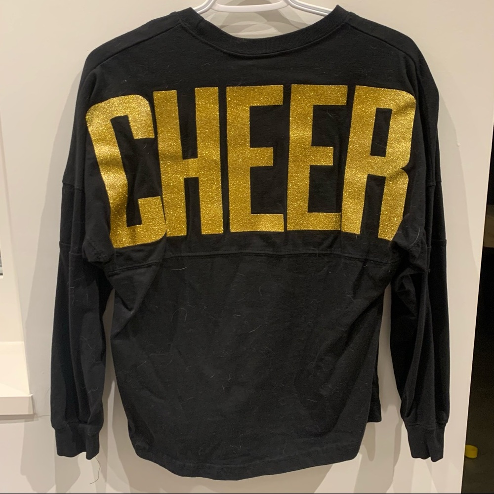 long sleeve with “CHEER” written on back